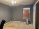 Smaller bedroom with neutral gray walls and carpet flooring at 2820 Brookford Sw Ln, Atlanta, GA 30331