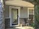 Home's entrance with a decorative glass door at 2820 Brookford Sw Ln, Atlanta, GA 30331