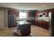 Spacious kitchen featuring granite countertops and dark wood cabinets at 2820 Brookford Sw Ln, Atlanta, GA 30331