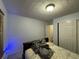 Bedroom with double door closet and a window with blinds at 2820 Brookford Sw Ln, Atlanta, GA 30331