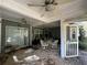 Covered patio with seating area and access to backyard at 2820 Brookford Sw Ln, Atlanta, GA 30331