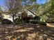 House exterior with stone accents and landscaping at 2820 Brookford Sw Ln, Atlanta, GA 30331