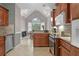 Bright kitchen with an island, granite counters, and breakfast nook at 620 Springview Dr, Covington, GA 30014