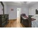 Main bedroom with hardwood floors and access to the bathroom at 620 Springview Dr, Covington, GA 30014