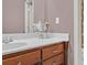 Bathroom with a vanity and a large mirror at 620 Springview Dr, Covington, GA 30014