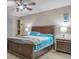 Spacious bedroom with a king-size bed and wooden furniture at 620 Springview Dr, Covington, GA 30014