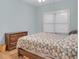 Bedroom with floral bedding and a dresser at 620 Springview Dr, Covington, GA 30014