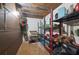 Clean and organized basement storage room with shelving units at 3520 Tom Brewer Rd, Loganville, GA 30052