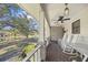 Relaxing front porch with rocking chairs and pond view at 3520 Tom Brewer Rd, Loganville, GA 30052