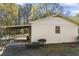 Detached workshop with covered patio and ample storage space at 3520 Tom Brewer Rd, Loganville, GA 30052