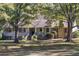 Brick ranch home with front porch and landscaping at 3520 Tom Brewer Rd, Loganville, GA 30052