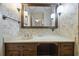 Vanity with sink, mirror and floral wallpaper, ample storage at 3520 Tom Brewer Rd, Loganville, GA 30052