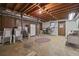 Finished basement with concrete floor, offers versatile space at 3520 Tom Brewer Rd, Loganville, GA 30052