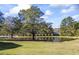 Peaceful pond reflecting a charming house at 3520 Tom Brewer Rd, Loganville, GA 30052