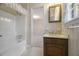 Updated bathroom with tub, shower, and vanity at 3520 Tom Brewer Rd, Loganville, GA 30052