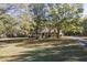Ranch home with large yard and mature trees at 3520 Tom Brewer Rd, Loganville, GA 30052