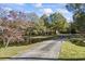 Long driveway, pond, and charming house at 3520 Tom Brewer Rd, Loganville, GA 30052