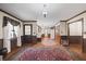 Dining room with hardwood floors and view into kitchen and living room at 3520 Tom Brewer Rd, Loganville, GA 30052