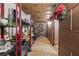 Storage area in basement with shelving units and various items at 3520 Tom Brewer Rd, Loganville, GA 30052