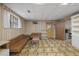 Finished basement recreational area with a couch at 3520 Tom Brewer Rd, Loganville, GA 30052