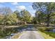 Beautiful house with pond and long driveway at 3520 Tom Brewer Rd, Loganville, GA 30052
