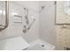 Walk-in shower with grab bars and updated fixtures at 3520 Tom Brewer Rd, Loganville, GA 30052