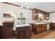 Kitchen with wood cabinets, butcher block countertops, and window at 3520 Tom Brewer Rd, Loganville, GA 30052