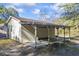 Detached workshop with covered patio and ample storage space at 3520 Tom Brewer Rd, Loganville, GA 30052