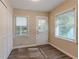 Laundry room with exterior access and vinyl flooring at 3289 Beech Dr, Decatur, GA 30032