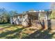 Ranch house with covered patio, wooden fence, and spacious yard at 3289 Beech Dr, Decatur, GA 30032