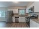 Modern kitchen with stainless steel appliances at 3289 Beech Dr, Decatur, GA 30032