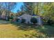 Ranch style house with carport and green lawn at 3289 Beech Dr, Decatur, GA 30032