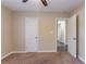 Bright bedroom with carpet flooring, neutral walls and ample closet space at 3289 Beech Dr, Decatur, GA 30032