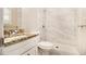 Bathroom with granite countertop and tiled shower/tub at 3060 Wilkes Plantation Way, Douglasville, GA 30135