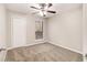 Bedroom with ceiling fan and double door closet at 3060 Wilkes Plantation Way, Douglasville, GA 30135