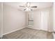 Well-lit bedroom with ceiling fan and closet at 3060 Wilkes Plantation Way, Douglasville, GA 30135