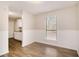 Simple dining area with hardwood floors and wainscoting at 3060 Wilkes Plantation Way, Douglasville, GA 30135