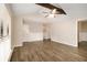 Bright living room with hardwood floors and ceiling fan at 3060 Wilkes Plantation Way, Douglasville, GA 30135