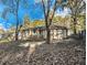 House with backyard, deck, and mature trees at 3811 Paul St, Douglasville, GA 30135