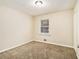 Bright bedroom with neutral walls and carpet flooring at 3811 Paul St, Douglasville, GA 30135