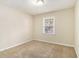 Spacious bedroom featuring neutral decor and carpet at 3811 Paul St, Douglasville, GA 30135