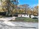 Ranch style home with carport, and a spacious yard at 3811 Paul St, Douglasville, GA 30135