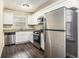 Renovated kitchen, granite countertops, stainless steel appliances at 3811 Paul St, Douglasville, GA 30135