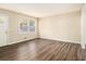Bright living room with wood-look floors and neutral walls at 3811 Paul St, Douglasville, GA 30135