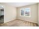 Spacious bedroom with neutral walls, carpeting, and large windows at 4257 Midway Rd, Douglasville, GA 30134