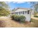 House exterior, gray brick, and dark shutters at 4257 Midway Rd, Douglasville, GA 30134