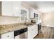 Renovated kitchen, featuring granite countertops and stainless steel appliances at 4257 Midway Rd, Douglasville, GA 30134