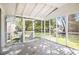 Cozy screened porch with wooden floors and backyard access at 4257 Midway Rd, Douglasville, GA 30134