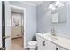 Clean bathroom with updated vanity, toilet, and shower/tub combo at 1396 Gale Dr, Norcross, GA 30093