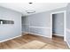 Dining room with wood-look floors and neutral walls at 1396 Gale Dr, Norcross, GA 30093